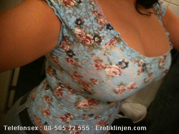 Telefonsex beskrivning: Stora sk�na br�st som en sommardr�m.